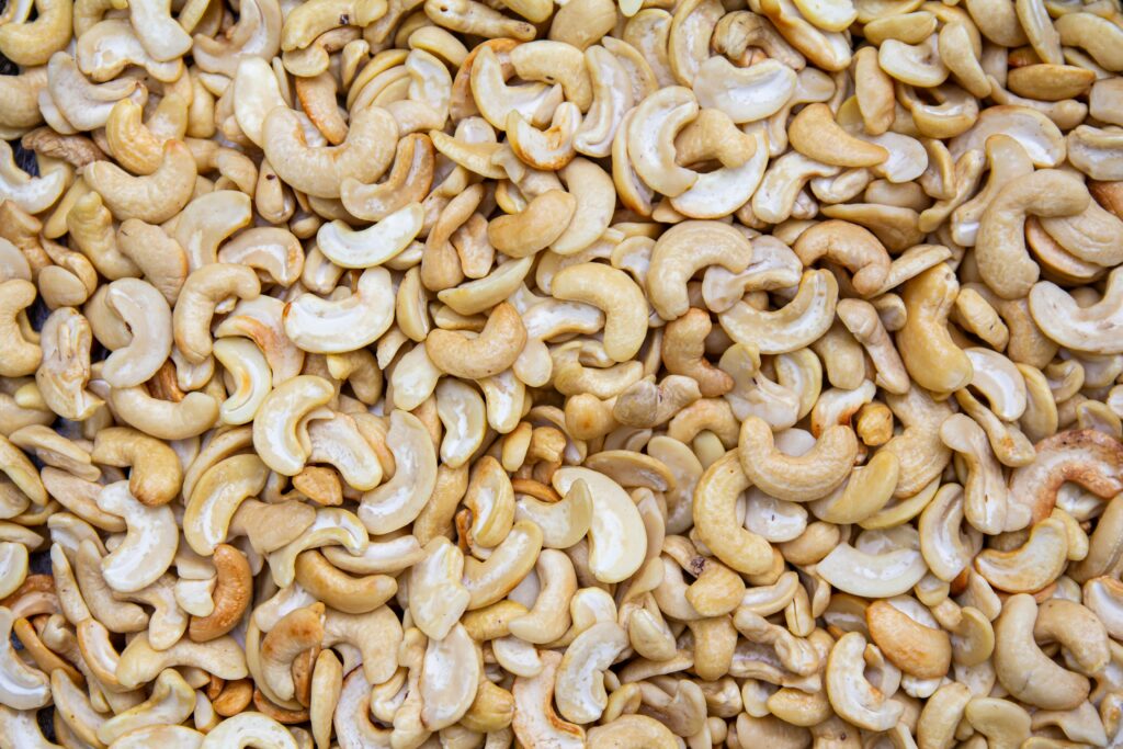 pexels photo 4663476 4663476 A detailed close-up of roasted cashew nuts creating a textured, appetizing backdrop.